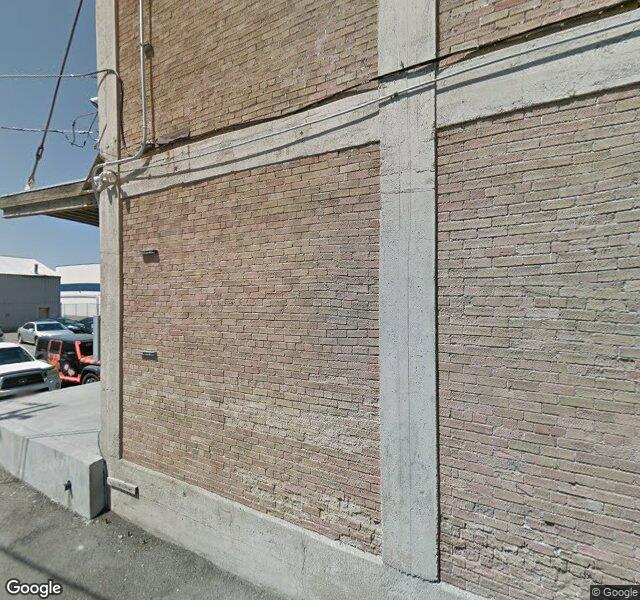 Andrés Romero Portrait storefront - Salt Lake City