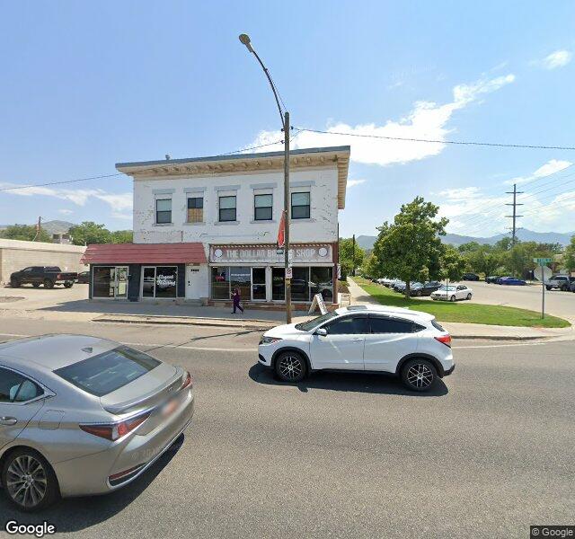 The Dollar Barber Shop storefront - Salt Lake City