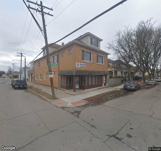 The Men’s Empire Barbershop storefront - Detroit